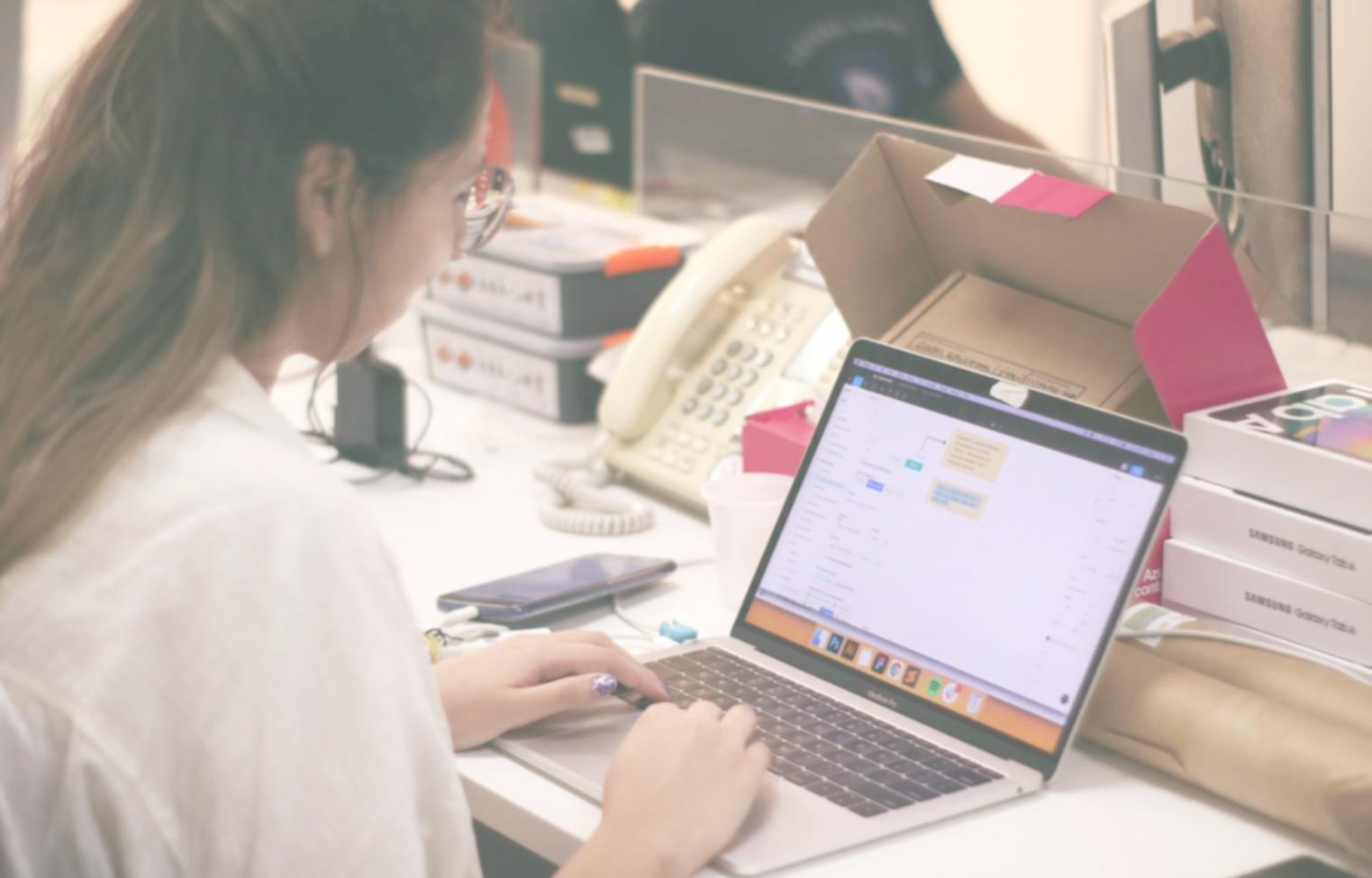 Workshop participants analyzing financial documents during negotiation training